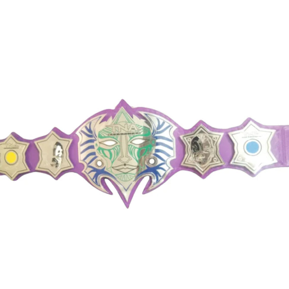 TNA Champions Forge immortal heavyweight championship belt with detailed face design on purple strap