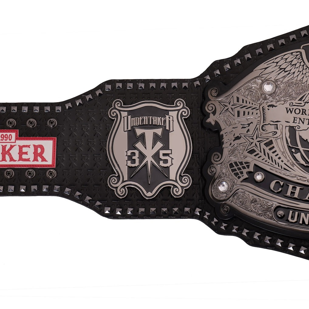 Right strap plate engraved with Undertaker TX 35 on WWE championship belt replica